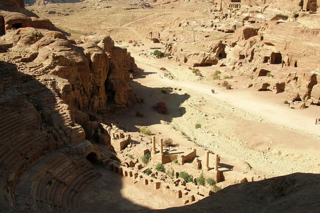 Rock-cut theater seating within the archaeological landscape of Petra