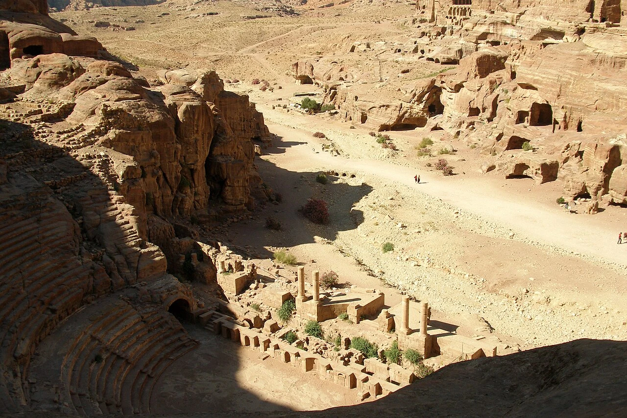 Rock-cut theater seating within the archaeological landscape of Petra